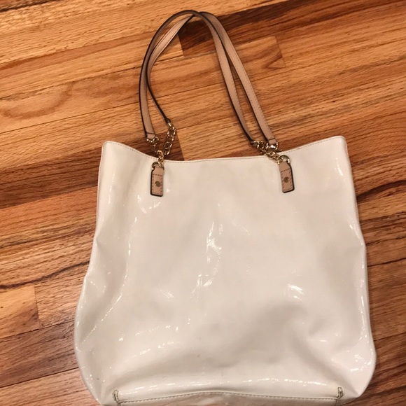 white patent leather handbag